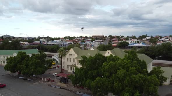 Drone footage of the Windhoek city in the morning, mountains on the horizon