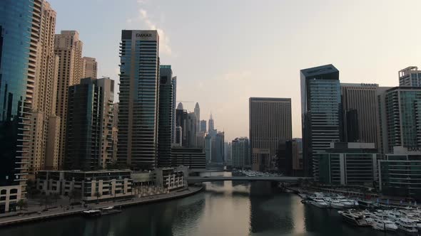 Luxury City of Dubai with Docks Full of Yachts and Massive Skyscrapers Around