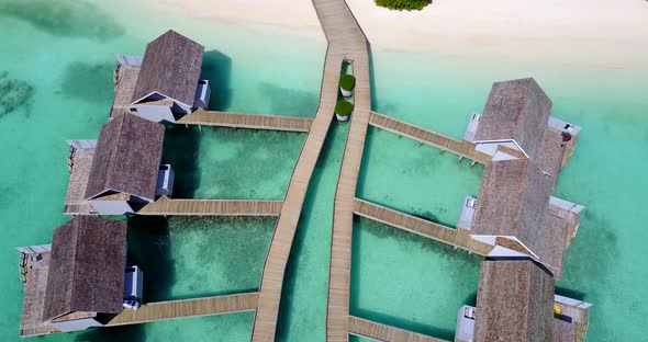 Luxury above island view of a sunshine white sandy paradise beach and blue water background 