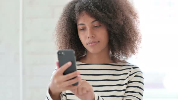 African Woman Using Smartphone 