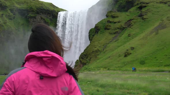 Traveler Travel to Skogafoss Waterfall in Iceland