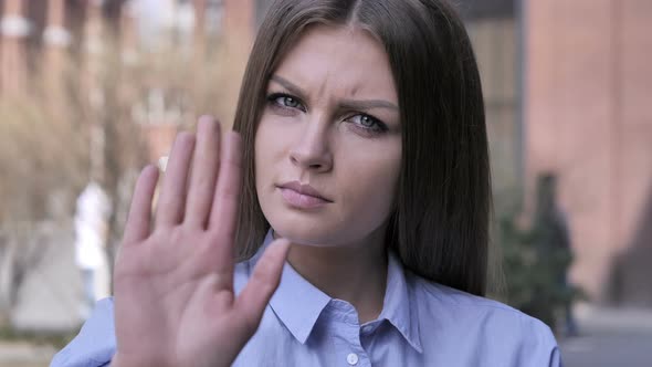 Stop Gesture by Adult Woman, Denying and Rejecting