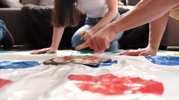 Diverse Group of Friends Plating Twister at Home