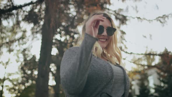 Blonde Woman Plus Size Wear Sunglasses Outside