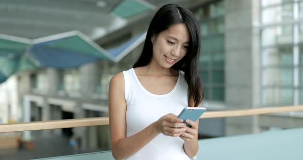 Woman using mobile phone 