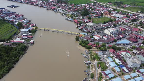 Aerial view fishing boat move at Kuala Kurau river
