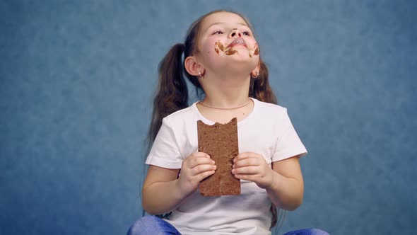 Dirty Girl Eating Chocolate