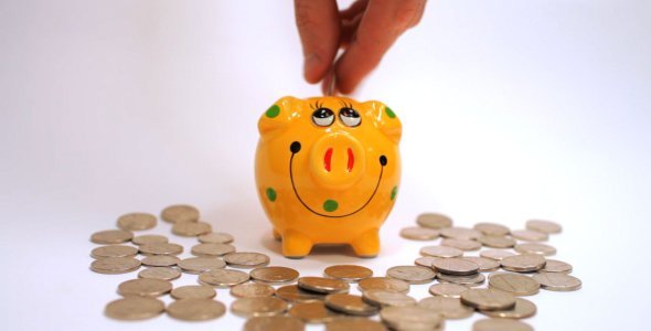 Putting Dollar Coins into Piggy Bank