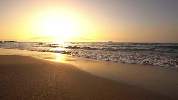 Beach Waves During Sunset in Slow Motion