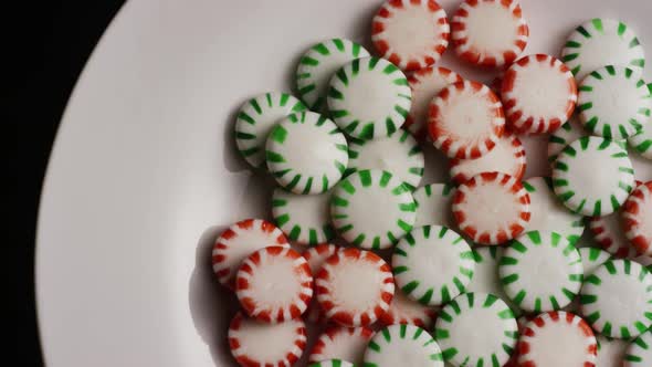 Rotating shot of spearmint hard candies - CANDY SPEARMINT 075