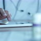 Doctor Typing On Tablet Pc One Hand - VideoHive Item for Sale