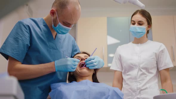 Oral Care Concept Lady on the Dentist Chair Have a alt