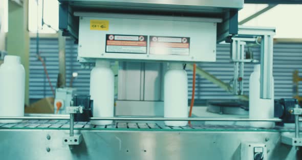 Machines in an automated chemical bottles production line