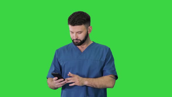 Surgeon Doctor Walking Using His Phone Green Screen Chroma Key