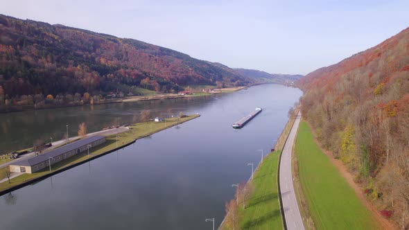 Cargo Pusher Boat on a River Transporting Cargo and Goods Along a River