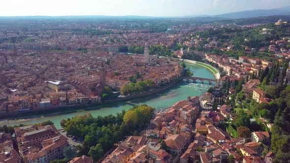 Verona, Italy. Aerial View of Famous Touristic City Verona in Italy at Sunset. Bright Sky with