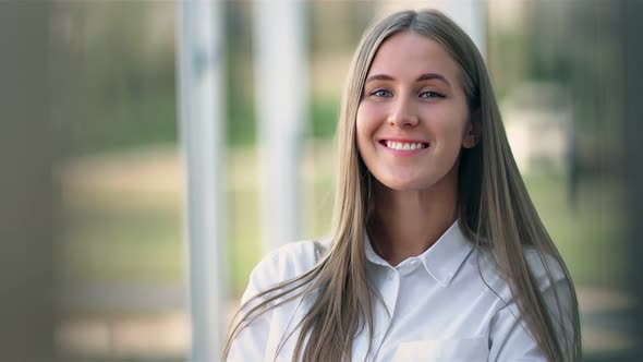 Portrait Smiling Attractive Young Businesswoman in White Shirt Medium Close Up