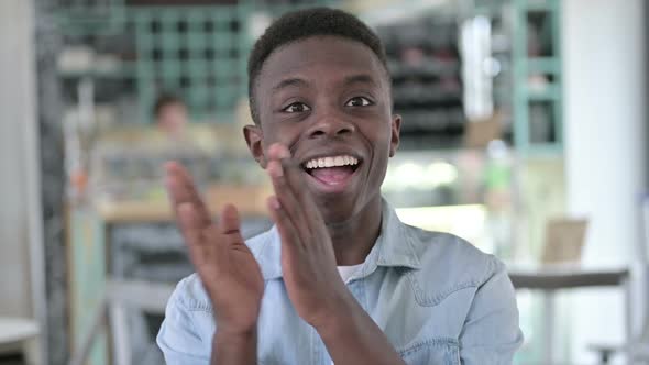 Appreciating African Man Clapping Cheering