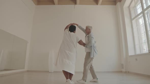 Diverse Mature Couple Dancing