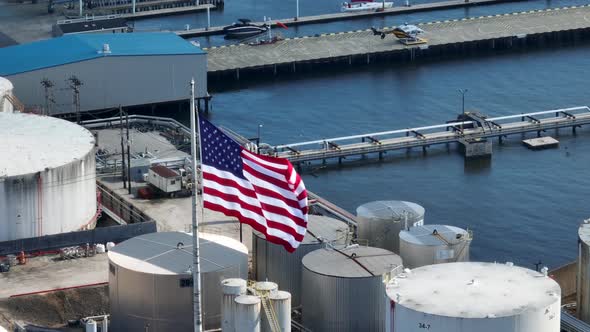 Bulk tank fuel storage in USA. Pipeline to port city. Aerial orbit of fuel crisis, energy consumptio