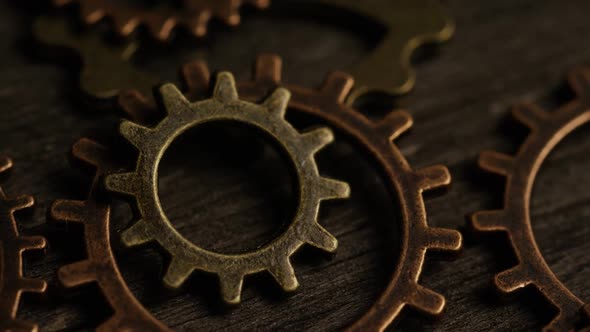 Rotating stock footage shot of antique and weathered watch faces 