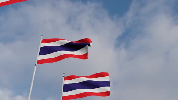 Waving Flags Of The Thailand blue sky