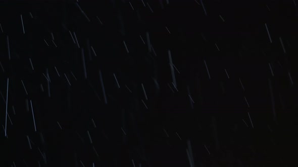 Rain pouring at night
