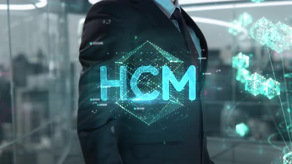 Businessman with HCM Hologram Concept