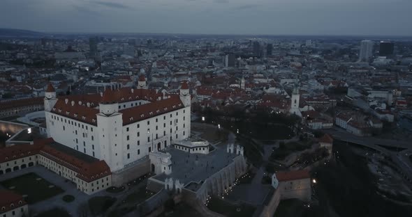 Aerial shot of Bratislava castle and old town at twilight, panorama