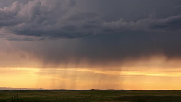 Lighting striking the ground from rain storm moving over the plains