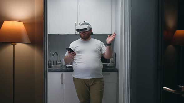 Overweight Man Test Vr Headset Using Smartphone App