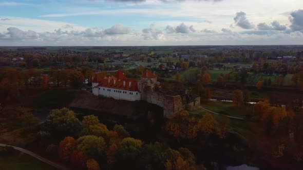 Bauska Medieval Castle Ruins Complex and Park From Above Aerial Shot 4K Video