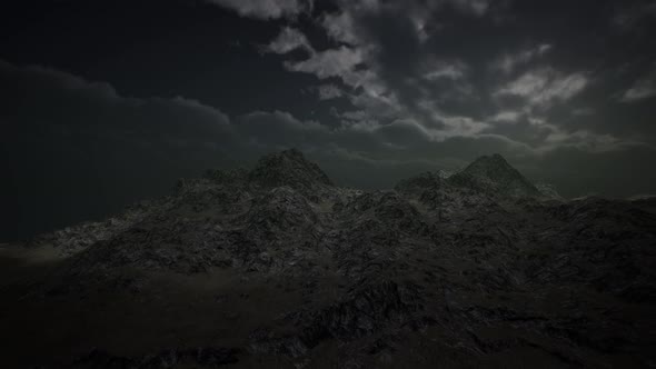 Dramatic Storm Sky Over Rough Mountains