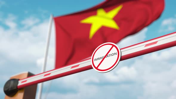Opening Boom Barrier with Stop Immigration Sign at Flag of Vietnam alt
