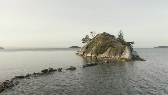 Aerial Panoramic View of Rocky Island on the Pacific Ocean West Coast