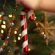 Little Childs Hands Decorate Christmas Tree with Lollipop - VideoHive Item for Sale