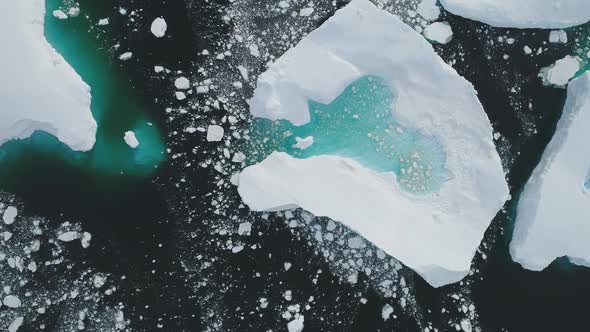 Antarctica Iceberg Turquoise Lake Top Aerial View