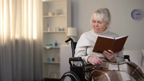 Grandmother Reading Book Asking Granddaughter to Bring Eyeglasses, Support