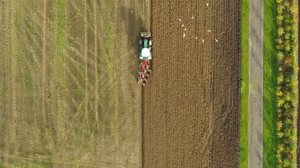 Tractor Plowing A Big Field In The Spring Time, Drone Stock Footage By Drone Rune 3 X