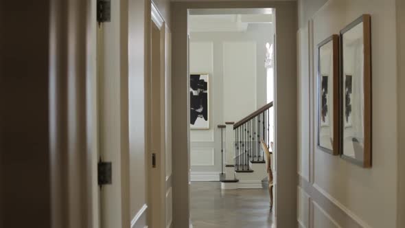 Hallway in luxury apartment building looks out to stairs