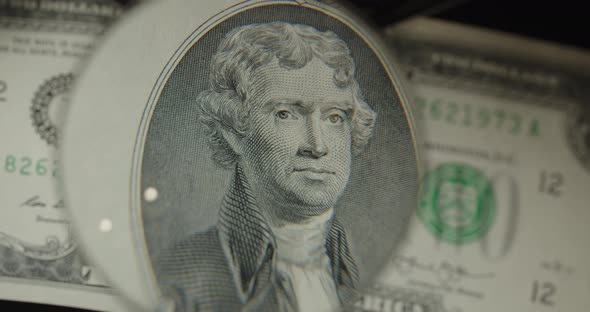 Two Us Dollars Cash Macro View. $ 2 Cash. Under A Magnifying Glass. One Hundred Dollars Close Up.