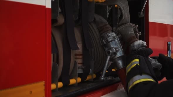 Rescue Team of Firefighters Arrive at the Crash Catastrophe Fire Site on Their Fire Engine