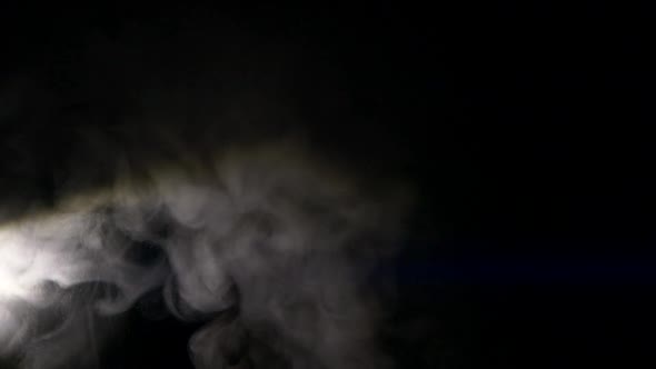 Slow Motion of White Abstract Smoke Fog Steam Cloud Mist on Black Background