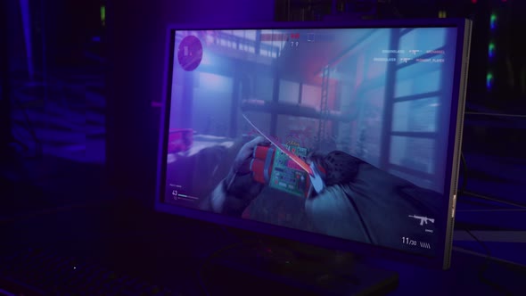 Player trying to prevent the bomb explosion in the modern computer video game alt