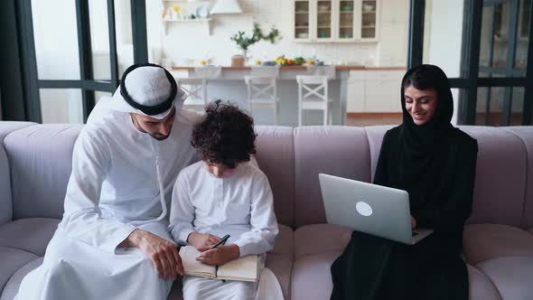 arabian family spending time together at home