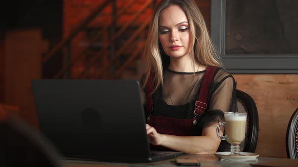 Girl Working at Her Laptop