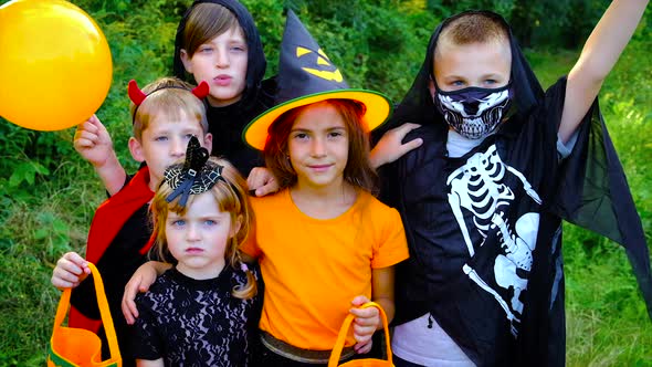 Children are Celebrating Halloween in Costumes