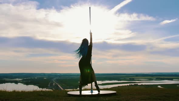 Pole Dance on Nature - Woman with Long Blue Braids Dancing on High Heels
