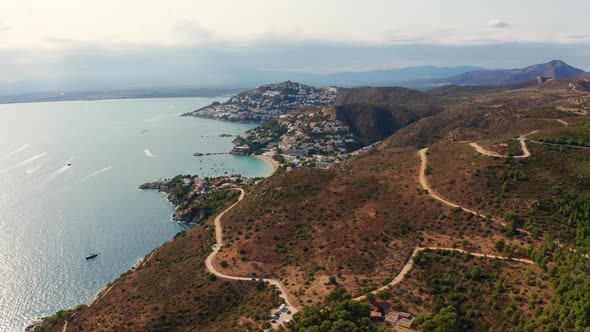 Drone Over Coastline Of Winding Road Of Cap De Creus