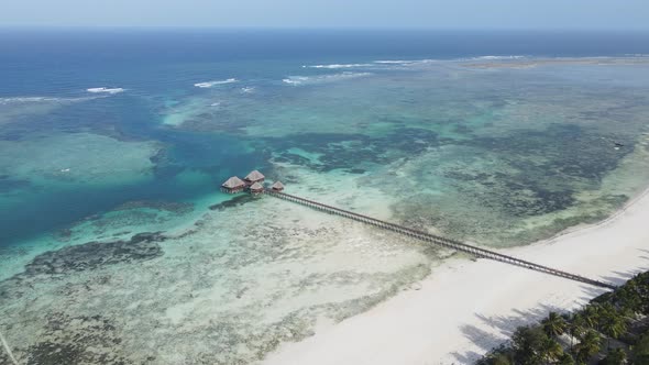 Aerial View of a House on Stilts in the Ocean on the Coast of Zanzibar Tanzania Slow Motion